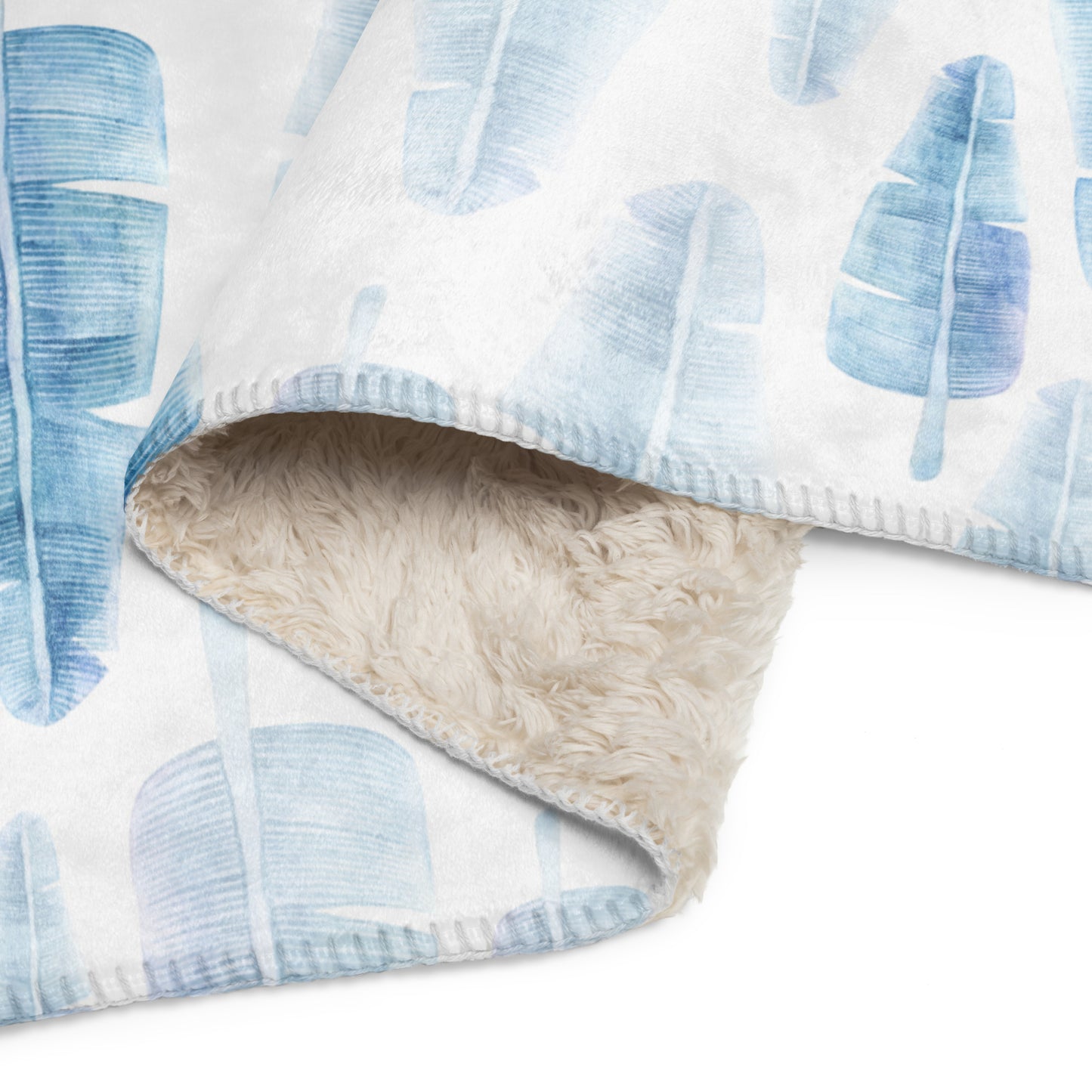 Blue tropical leaves sherpa blanket